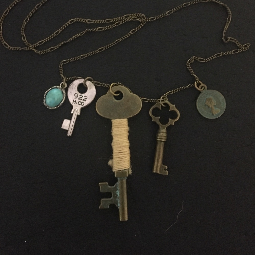 Vintage key, coin, and turquoise stone necklace